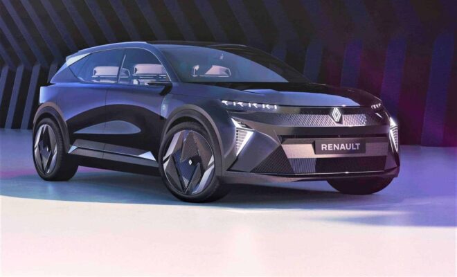 Sleek Renault electric concept car with futuristic design and sharp LED headlights.