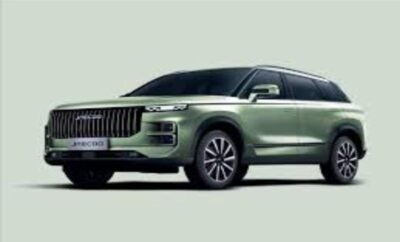 A sleek green luxury SUV with modern design features.