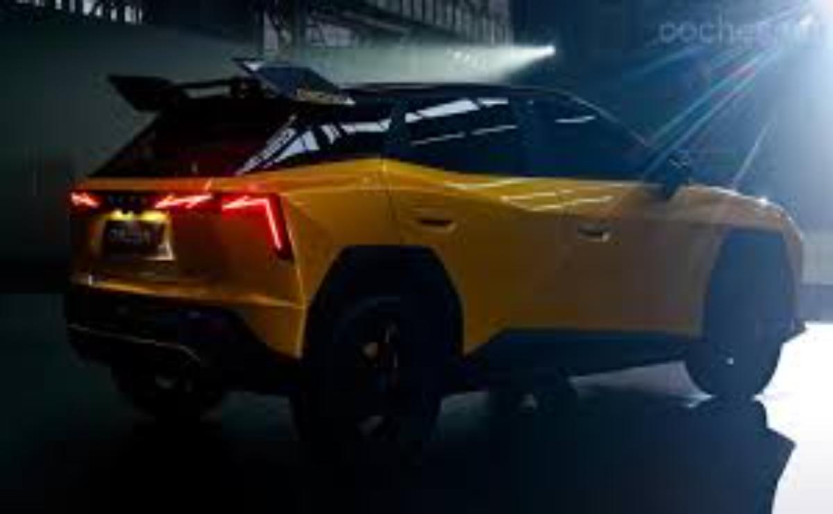 Yellow Lamborghini Urus speeding at night with dramatic lighting.