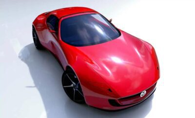 Sleek red sports car with glossy finish and modern design.