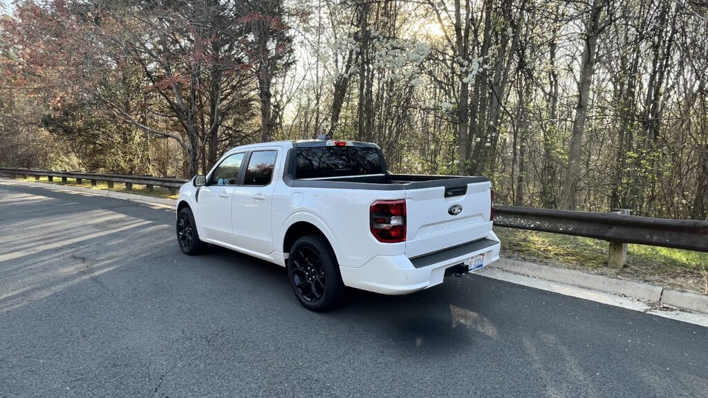 Side view of the 2025 Ford Maverick Lobo highlighting its aggressive lowered suspension and unique black wheels